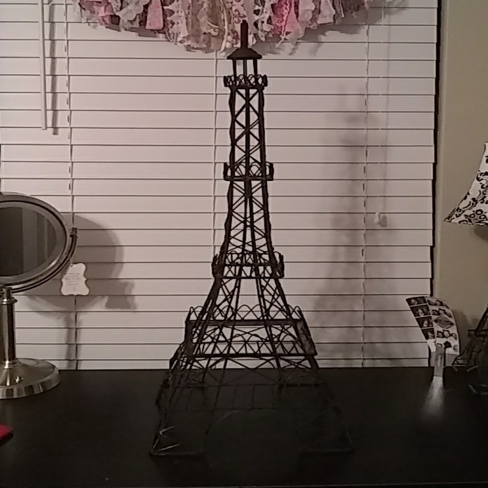 It is a 2 3/4 tall Eiffel tower